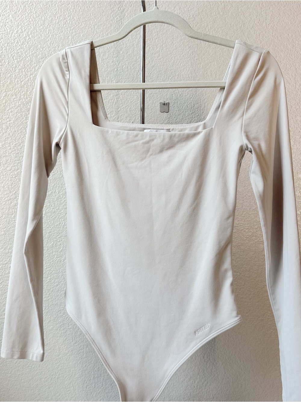 Aritzia Long Sleeve Square Neck Bodysuit in Light Cream